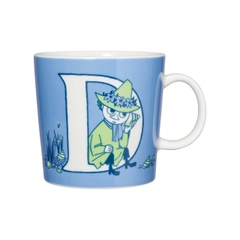 Mug 0,4L ABC D - The D mug shows spring has arrived to Moominvalley bringing Snufkin with it. Moomintroll and Little My are happy to have Snufkin back again, especially Moomintroll who is always eagerly ...