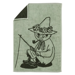 Hand towel 50x70cm Snufkin green - Enjoy the soft coziness of a green Moomin hand towel made out of organic cotton, featuring the harmonica-playing wayfarer ... The product is Global Organic Textile Standard (GOTS) certified.
