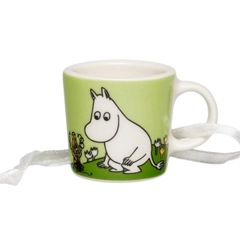Mini mug Moomintroll grass-green - The 12-millilitre mugs are mini-sized reproductions of the beloved Moomin mugs. The mug features the loyal fellow Moomintroll. Moomintroll is a happy fellow and endlessly curious.