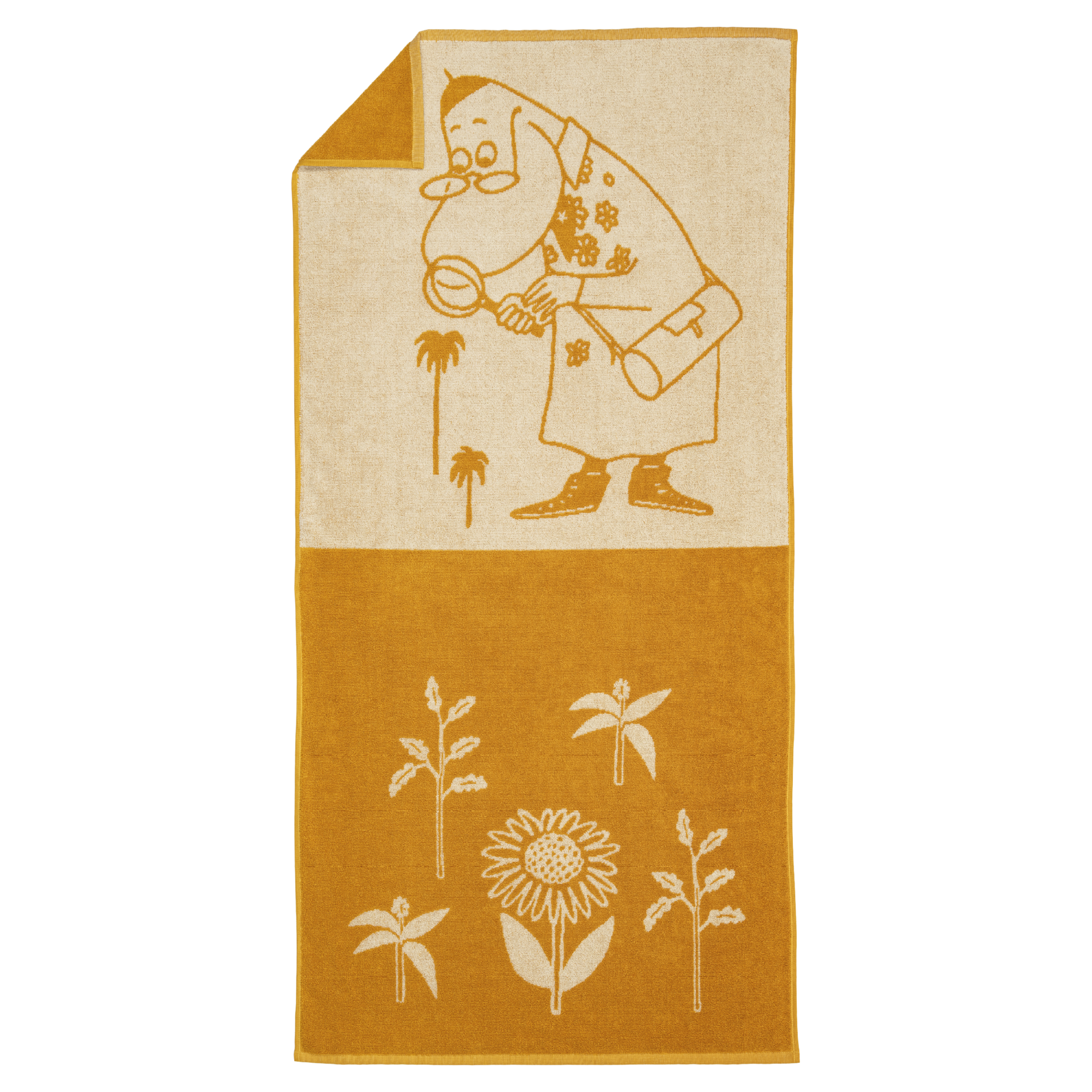 A yellow bath towel with a two-tone design. The top half is cream with a tan illustration of Hemulen holding a magnifying glass near plants. Bottom half has lowers.