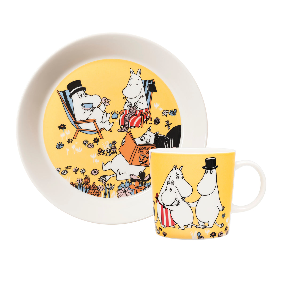 A Moomin-themed dinnerware set featuring a yellow plate and matching mug with the Family Time illustration, shown on a clean white background.