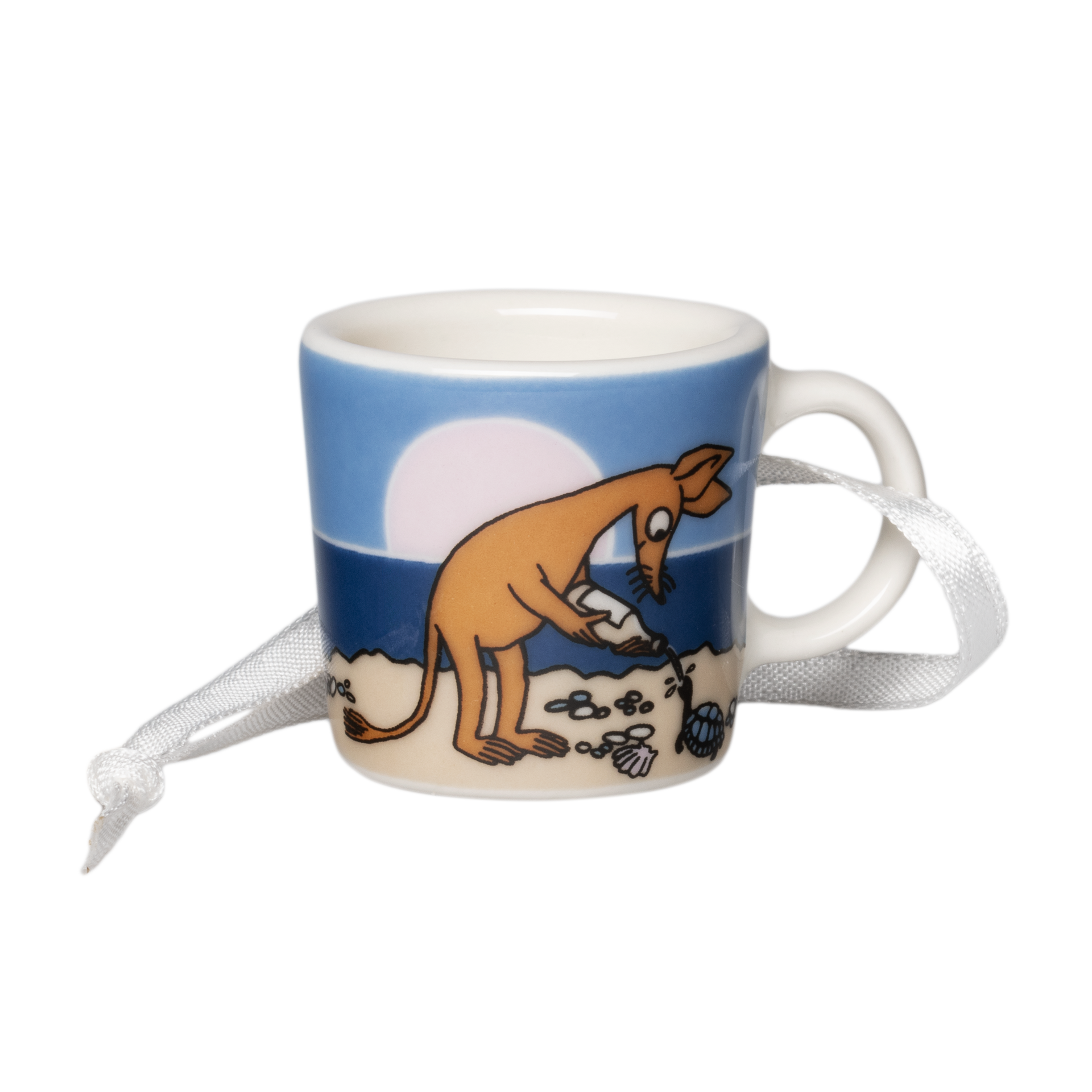 A white ceramic mini mug featuring a cartoon illustration of Sniff on a beach under a blue sky, with a white ribbon tied to the handle.