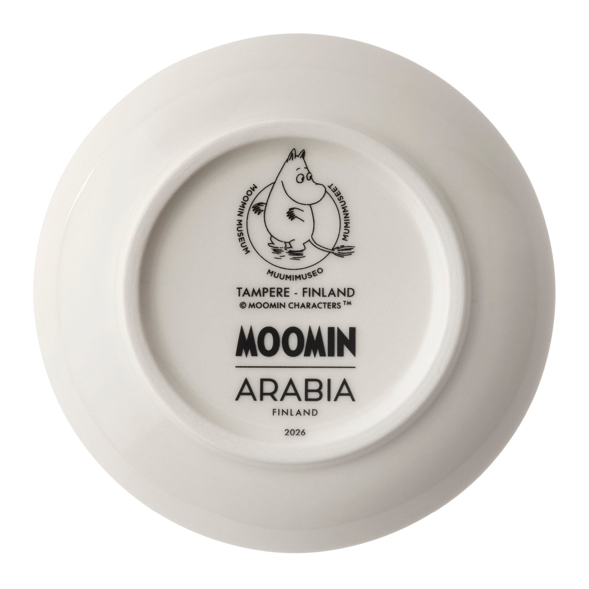 Moomin mini plate 10,5cm Winternight glow 2pc - White ceramic mini plate shown from the bottom, featuring a black printed Moomin Arabia logo and text including 'MOOMIN ARABIA FINLAND' and '2026'.