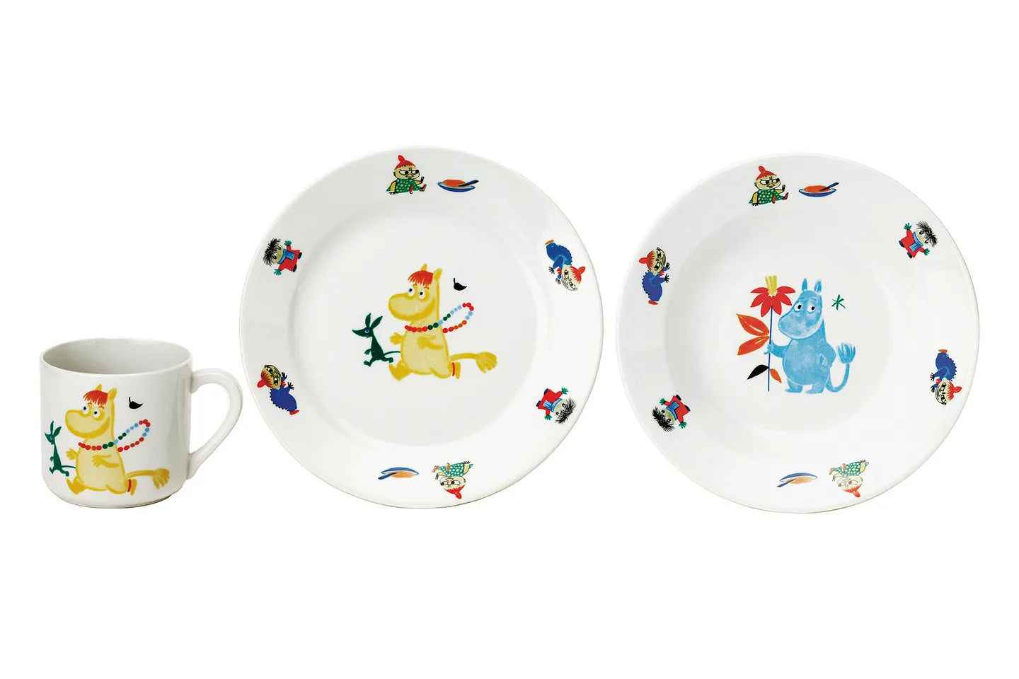 The first Moomin Arabia children's tableware set with moomin characters on a white background