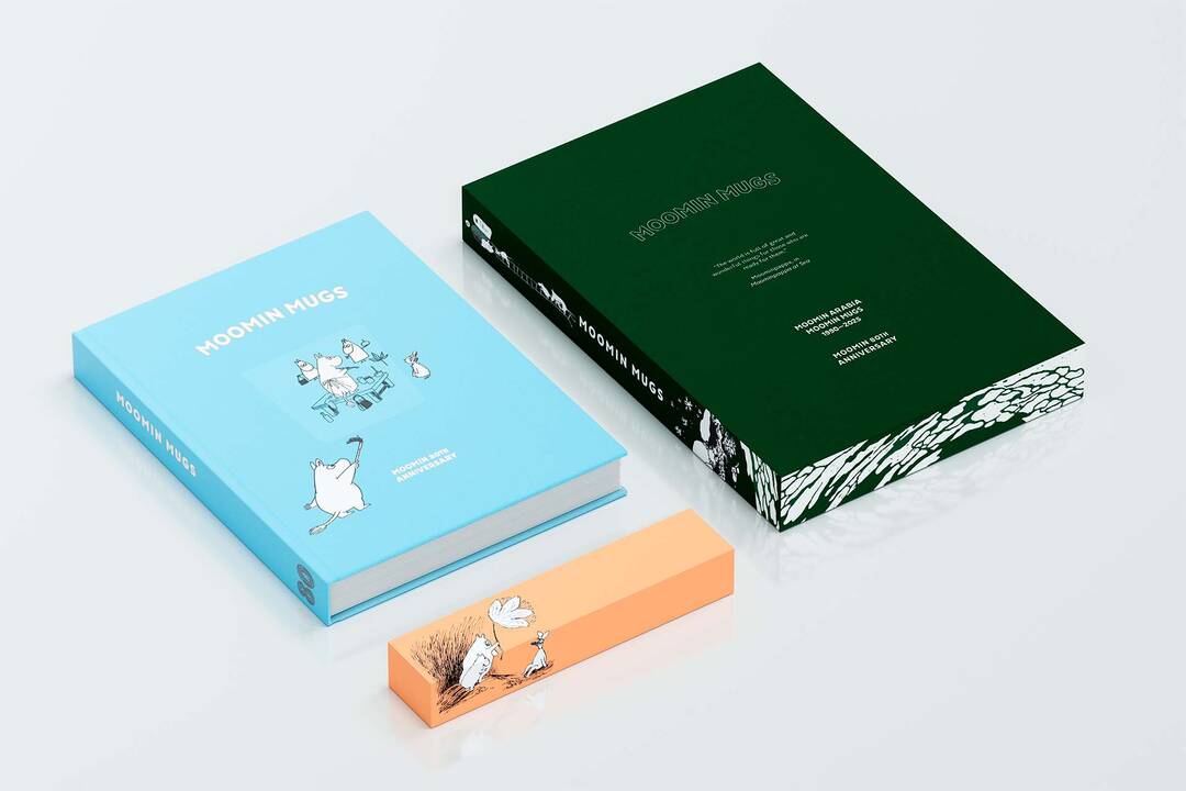 Two books about moomin mugs, one blue and one green, with a small orange box featuring Moomin illustrations on a light gray background.