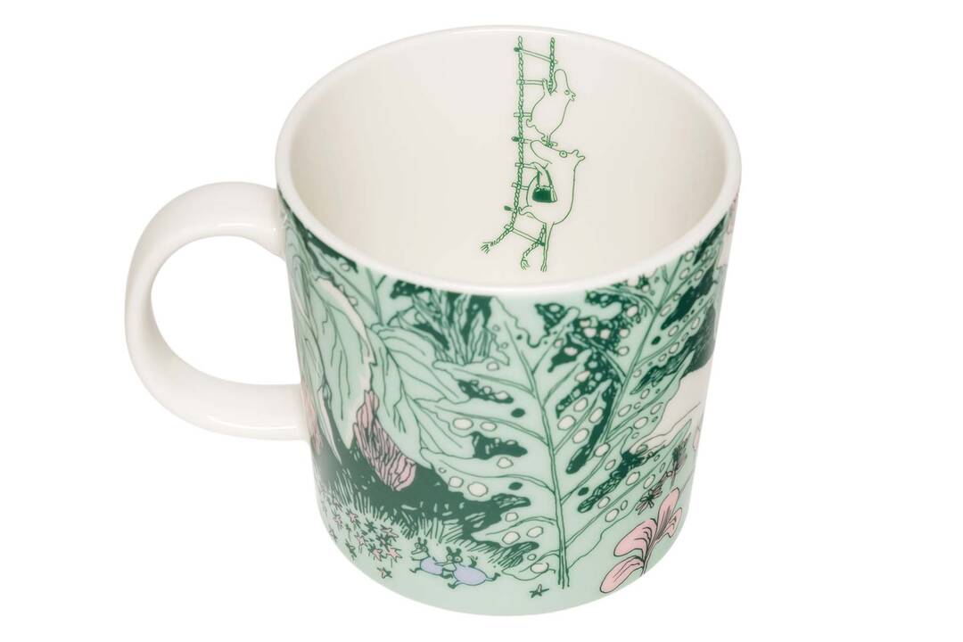 Mug with green leaf pattern and inner decal showing Moominmamma and moomintroll climbing a ladder